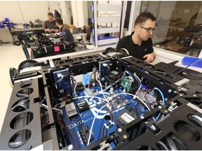 ATTAbotics Inc. put together robots as the Opportunity Calgary Investment Fund selected the local tech company for funding in Calgary on Wednesday December 12, 2018. Darren Makowichuk/Postmedia