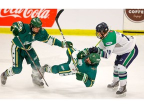 Calgary Northstars Brett Huxley and Grayson Reid mix it up with Zac Funk of the Fraser Valley Thunderbirds during the Mac's AAA hockey tournament at Max Bell Centre on Wednesday, December 26, 2018. Al Charest/Postmedia