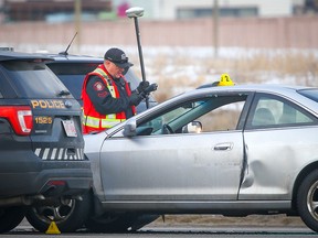 The Alberta Serious Incident Response Team investigates after officer-involved shooting on McKnight Boulevard between 68th Street N.E. and Stoney Trail in Calgary on Christmas Day. Al Charest/Postmedia