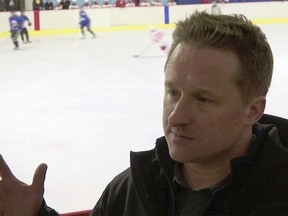 In this image made from video taken on March 11, 2016, entrepreneur Michael Spavor speaks during a friendly ice hockey match between visiting foreigners and North Korean players in Pyongyang, North Korea. A second Canadian man is feared detained in China in what appears to be retaliation for Canada's arrest of a top executive of telecommunications giant Huawei. The possible arrest raises the stakes in an international dispute that threatens relations. Canada's Global Affairs department on Wednesday, Dec. 12, 2018, said Spavor, an entrepreneur who is one of the only Westerners to have met North Korean leader Kim Jong Un, had gone missing in China. Spavor's disappearance follows China's detention of a former Canadian diplomat in Beijing earlier this week. (AP Photo) ORG XMIT: TKSK302