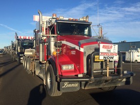 Hundreds of trucks line up for a convoy event in Nisku, Alta. on Wednesday, Dec. 19, 2018.