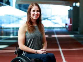 Kara Douville poses for a photo in the Performance Training Centre at Winsport gym. Douville's family and friends are hoping to raise $16,000 needed to buy her a handcycle so she can pursue her bid to become an Olympian.Friday, December 28, 2018. Dean Pilling/Postmedia