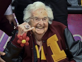 In this Nov. 27, 2018, file photo, Loyola of Chicago's Sister Jean shows off the NCAA Final Four ring she received before an NCAA college basketball game between Loyola of Chicago and Nevada in Chicago.