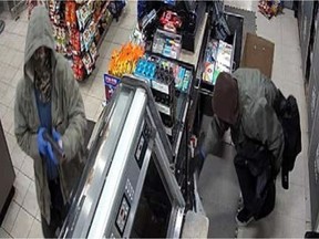 Police are looking for a pair of armed suspects linked to three separate robberies between Dec. 19 and Dec. 30, one of which left a convenience store clerk with a head injury.