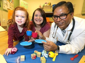 Dr. Abhay Lodha, MD, lead researcher with mom Avril Strachan and daughter, Anna,2, as developing brains of premature babies benefit from caffeine therapy as caffeine is the most commonly used drug in the neonatal intensive care unit, or NICU, after antibiotics. Itís given to help premature babies breathe and boost lung function. A new study by the University of Calgaryís Dr. Abhay Lodha, MD, shows the earlier the dose of caffeine can be given, the better at the Alberta Childrenís Hospital in Calgary on Tuesday December 11, 2018. Darren Makowichuk/Postmedia