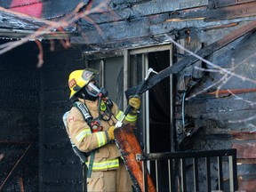 Calgary firefighters knocked down a fire at the back of a home on the 8000 block of Centre St. North on Sunday morning December 9, 2018. Gavin Young/Postmedia