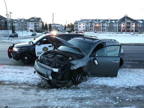 A heavily damaged car rests near the corner of 26th avenue and 66th street N.E. in Pineridge after a police chase on Monday morning December 17, 2018. 
Gavin Young/Postmedia