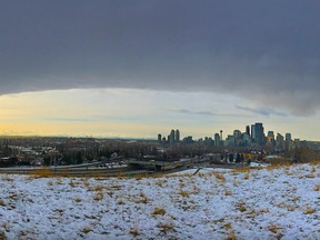 A chinook arch stretches over Calgary on Tuesday, Dec. 11, 2018. The chinook has brought warm temperatures and strong winds to southern Alberta.