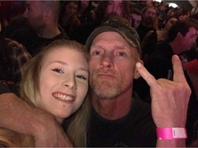A video of Karri Carberry, left, signing the lyrics to songs at the Three Days Grace concert on Wednesday, Dec. 12, 2018 at the Shaw Conference Centre for her deaf father Darrin Carberry has gone viral.