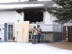 The scene of a deadly house fire on Maidstone Drive N.E. on Monday, Dec. 24, 2018.