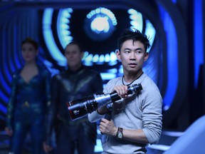 James Wan on the set of Aquaman. (Warner Bros.)