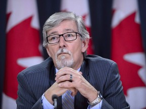 Privacy Commissioner Daniel Therrien holds a news conference to discuss his annual report in Ottawa on Thursday, Sept. 27, 2018. Canada's privacy watchdog says government must take stronger actions to protect Canadians' digital privacy in light of the ongoing and lightning-fast evolution of data collection.