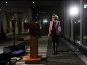 Alberta Premier Rachel Notley approaches a podium to make an announcement of a mandatory cut in oil production to deal with a price crisis that is costing Canada an estimated $80 million a day, in Edmonton on Sunday, Dec. 2, 2018.