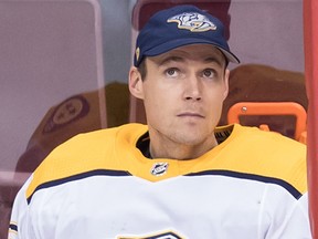 Nashville Predators goalie Pekka Rinne, sits on the bench during the third period of his team's game against the Vancouver Canucks,on Dec. 6, 2018. Rinne allowed four goals in the first two periods. (DARRLY DYCK/The Canadian Press)