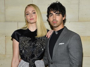 Sophie Turner and Joe Jonas attend the Louis Vuitton show as part of the Paris Fashion Week Womenswear Spring/Summer 2019 on Oct. 2, 2018 in Paris, France.