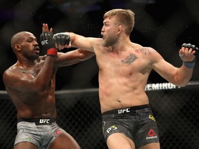 Jon Jones (left) avoids a punch by Alexander Gustafsson of Sweden (right) during a Light Heavyweight titlebout during the UFC 232 event inside The Forum on December 29, 2018 in Inglewood, California. (Sean M. Haffey/Getty Images)