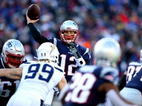 Tom Brady #12 of the New England Patriots throws during the second quarter in the AFC Divisional Playoff Game against the Los Angeles Chargers at Gillette Stadium on January 13, 2019 in Foxborough, Massachusetts. (Photo by Maddie Meyer/Getty Images)