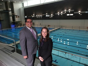 Mayor Naheed Nenshi, left and Shannon Doram,YMCA president, right, pose for a photo inside Brookfield Residential YMCA at Seton in Calgary, on Thursday January 10, 2019. Leah Hennel/Postmedia