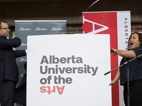 Marlin Schmidt, Minister of Advanced Education, left and Simone Saunders, student, Alberta College of Art + Design reveal the new name for the art school now known as Alberta University of the Arts in Calgary, on Thursday January 17, 2019. Leah Hennel/Postmedia
