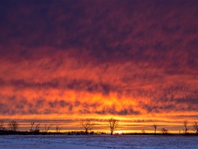 A momentary, fiery sunrise at Cluny, Ab., on Tuesday, January 22, 2019. Mike Drew/Postmedia