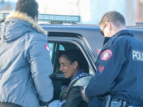 A mother and her baby are reunited after her car was stolen outside the Sunridge professional building in northeast Calgary on Monday, Jan. 21, 2019.