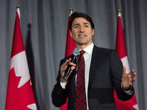 Prime Minister Justin Trudeau speaks during a Liberal fundraising event at St. Lawrence College in Kingston, Ontario, on Wednesday Dec.19, 2018. Trudeau is hitting British Columbia today as part of an outreach tour.