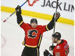 Flames Curtis Lazar  (L) and Matt Stajan celebrates Stajan's second period goal during game action between the Tampa Bay Lightning and Calgary Flames in Calgary on Thursday, February 1, 2018. Jim Wells/Postmedia