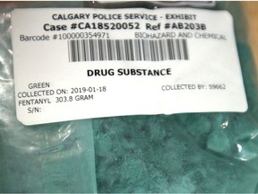 A quantity of fentanyl pills seized by Calgary Police and ALERT is displayed at a press conference in Calgary on Wednesday, January 30, 2019. The suspected lab was operating inside a detached garage at a home in the Calgary neighbourhood of Forest Lawn.Jim Wells/Postmedia