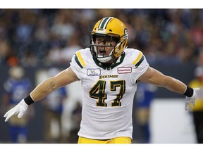 Edmonton Eskimos' JC Sherritt (47) celebrates his fumble recovery against the Winnipeg Blue Bombers during the first half of CFL action in Winnipeg on June 14, 2018. Linebacker J.C. Sherritt retired Wednesday after spending his entire eight-year CFL career with the Edmonton Eskimos. Sherritt, 30, was the CFL's top defensive player in 2012 and helped Edmonton capture the Grey Cup in 2015. The California native appeared in 109 career games, registering 552 tackles, 15 sacks, 17 forced fumbles, 14 interceptions, six fumble recoveries and one TD.