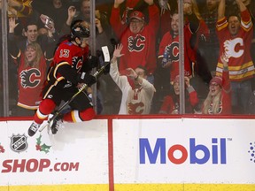 Calgary Flames Johnny Gaudreau scores on Tampa Bay Lightning Louis Domingue to tie the game in third period action at the Scotiabank Saddledome in Calgary on Thursday December 20, 2018. Darren Makowichuk/Postmedia