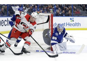 Carolina Hurricanes left wing Micheal Ferland (79) moves in for a shot on Tampa Bay Lightning goaltender Andrei Vasilevskiy (88) during the first period of an NHL hockey game Thursday, Jan. 10, 2019, in Tampa, Fla.