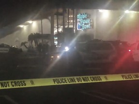 Police rope off the scene of a shooting at a bowling alley in Torrance, Calif., early Saturday, Jan. 5, 2019. (AP Photo/APTN)