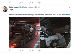 One of the #yyctraffic tweets showing the transport truck wedged under a rail bridge on 1st Street S.W.