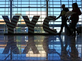 Calgary saw more than 4.1 million out-of-towners stay overnight in Calgary last year, and the Conference Board of Canada is forecasting that number to increase to more than 4.25 million for 2019. Passengers arrive at the international departures level at the Calgary International Airport on Monday morning December 17, 2018. (Gavin Young / Postmedia)