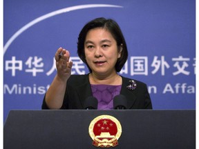 China's state media say a Canadian charged with smuggling drugs will be in court for an appeal on Saturday. Chinese foreign ministry spokeswoman Hua Chunying gestures during a press briefing at the Ministry of Foreign Affairs building in Beijing on Sept. 15, 2017.