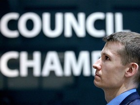 Calgary Coun Jeremy Farkas listens to media ask questions to Mayor Naheed Nenshi during an afternoon break from Council meetings in Calgary on Tuesday, January 15, 2019. Jim Wells/Postmedia