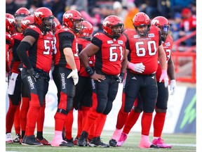 Calgary Stampeders offensive line Randy Richards, Brad Erdos, Ucambre Williams, Shane Bergman and Derek Dennis during CFL football in Calgary in this photo from last season. File photo by Al Charest/Postmedia.