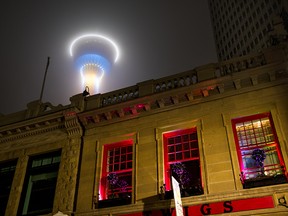 The Calgary Tower glows in the low clouds on Sunday, April 24, 2016.