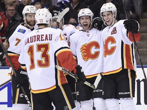 Several Calgary Flames players are in the running for the NHL's top awards this season, including Johnny Gaudreau and Sean Monahan, right.