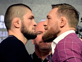 Lightweight champion Khabib Nurmagomedov, left, faces off with Conor McGregor during the UFC 229 press conference at Radio City Music Hall on Sept. 20, 2018 in New York City.  (Steven Ryan/Getty Images)