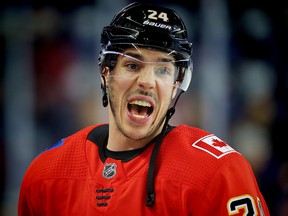 Flames defenceman Travis Hamonic makes a point during a pre-game skate.