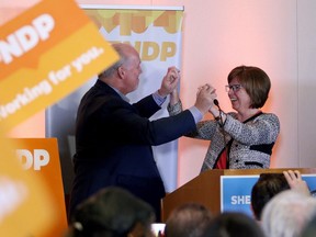 NDP candidate Sheila Malcolmson celebrates with Premier John Horgan after winning the byelection in Nanaimo, B.C., on Wednesday, January 30, 2019.