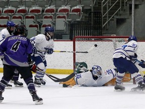 Brianne Jenner scores for the Calgary Inferno during the Start the Spark game Saturday night against the Toronto Furies.