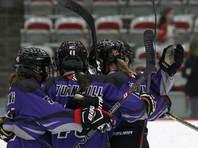 The Calgary Infero celebrate their win over the Toronto Furies on Saturday.