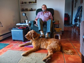 Stan Parsons, 84, pictured at his home in Calgary, has to find a new place to live by the end of February. The senior, who is on a fixed income, says he hasn't been able to find anywhere affordable that will accept pets the size of his dog Jellybean.