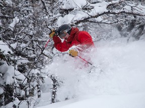 A skier plows through fresh powder at Lake Louise Ski Resort west of Banff on Friday, Jan. 4, 2019. More than a meter of snow has fallen in the past few days as a storm hits the mountain parks.