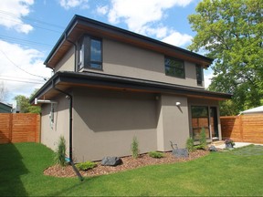 A garage with a secondary suite above in West Hillhurst.