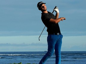 Adam Svensson watches his shot from the 17th tee during the first round of the Sony Open golf tournament Thursday, Jan. 10, 2019, at Waialae Country Club in Honolulu.
