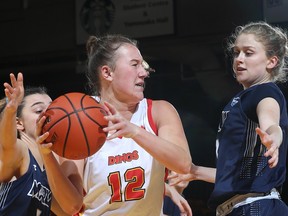 The Calgary Dinos women's basketball squad faces the Regina Cougars in their Canada West semifinal series. Photo by David Moll/Special to Postmedia.