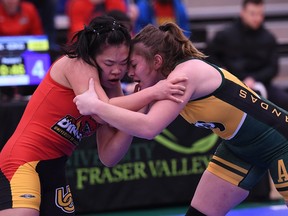 Vivian Mark (left) will be wrestling in the 63kg division during this weekend's U Sports championships at the U of C. Photo by Evan Seal/Special to Postmedia.
